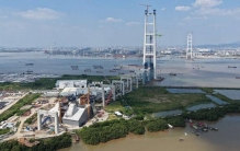 140万吨定海神针扎根珠江口！世界最大悬索桥锚碇今日完工